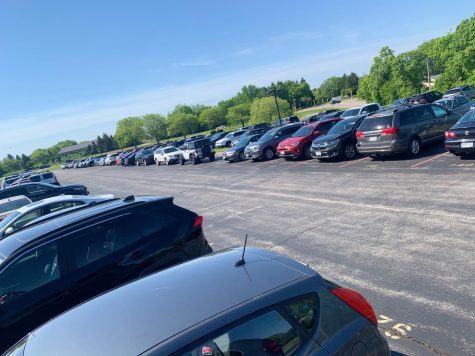 The red lot is one of six lots students can park in---but it comes with a price. 