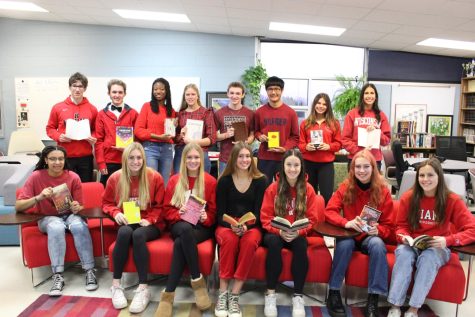 The AP Literature and Composition students pose with their favorite books. 