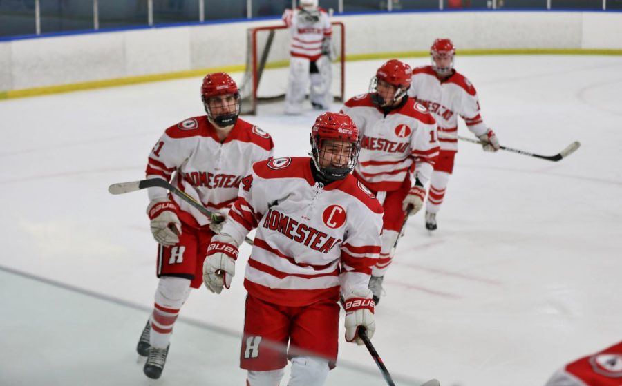 On Feb. 15, the boys hockey team defeated their conference rivals in the first playoff game of the season. Weve been struggling during this last part of the season, so it was really amazing to come together and perform as a team, Jack Wojnowski, senior captain, said.