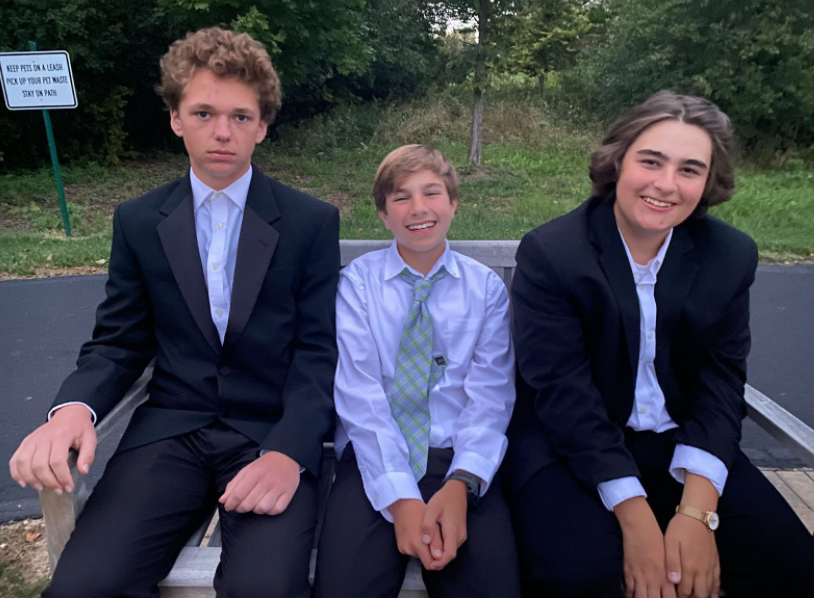 Aiden+O%E2%80%99Connor%2C+freshman%2C+takes+photos+before+Homecoming+with+Aidan+Patterson+%28left%29+and+Heino+Omdahl+%28right%29.+This+was+their+first+Homecoming.%0A