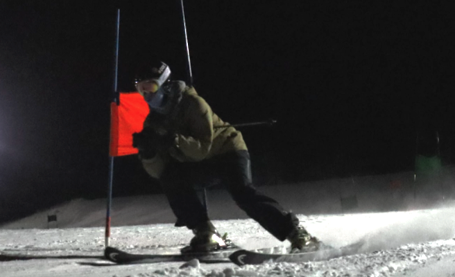 Ski team members practice their course before every meet.