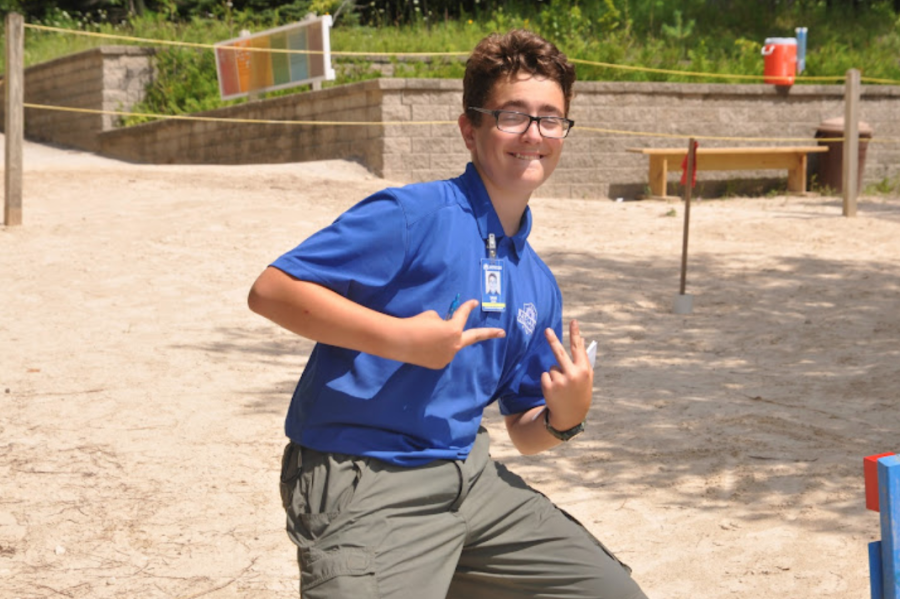 Sam Hemr, freshman, works his summer job as a camp counselor at Camp Rokilio. This was his first year working there.