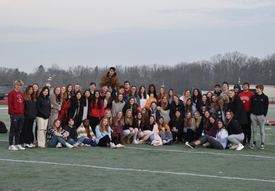 The senior class posses for a group picture at the sunrise event. 