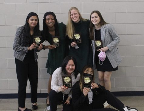 Nationals qualifiers pose with their award plaques.
