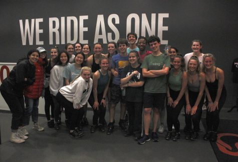Students gather for a photo after their workout at CycleBar.