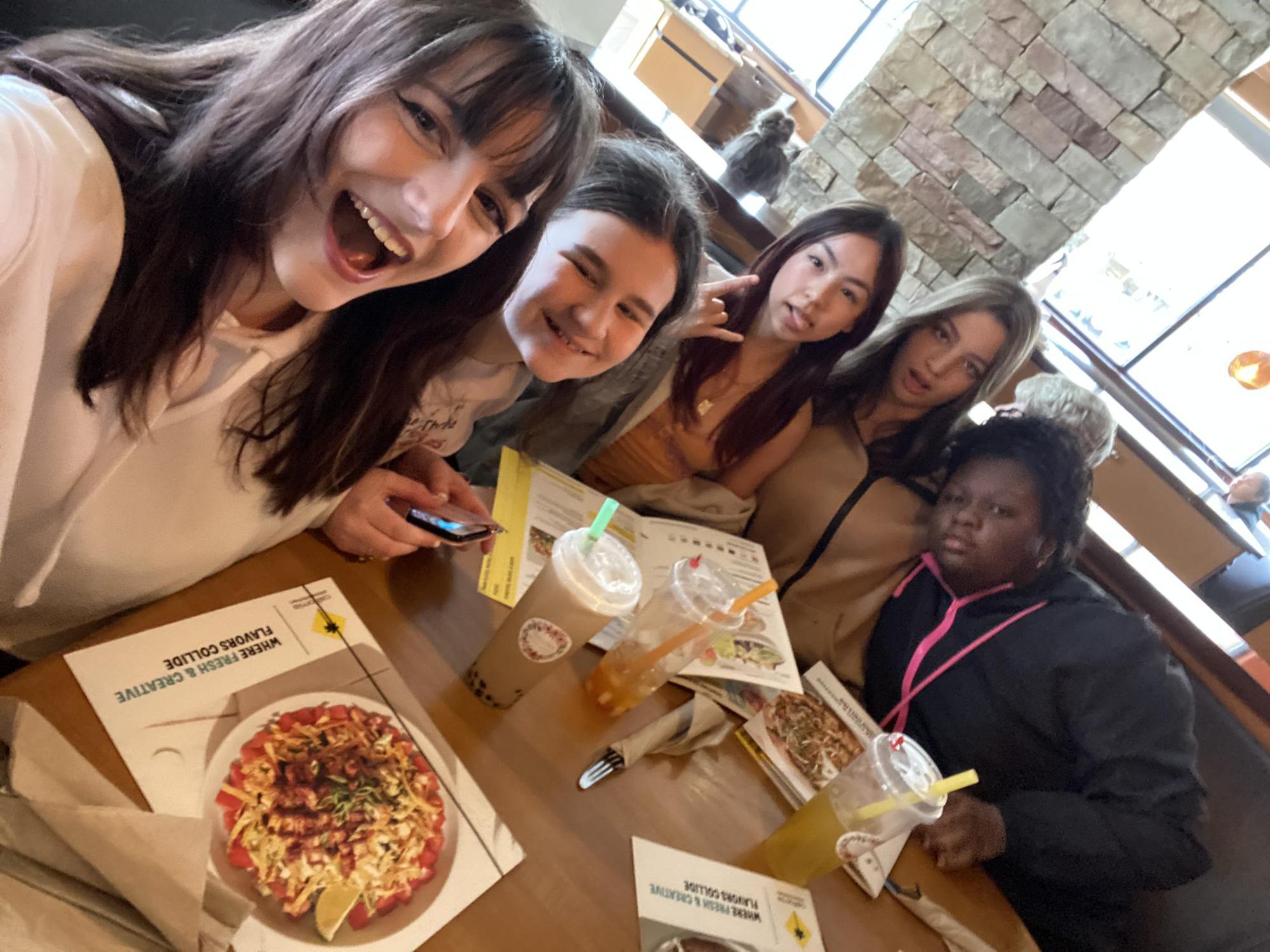 Camryn Bennett (left), freshman, at lunch with her friends Adrianna Kelly, Maggie Wendorf, Allie Smeyan, and Trinity Crouther, freshmen. 