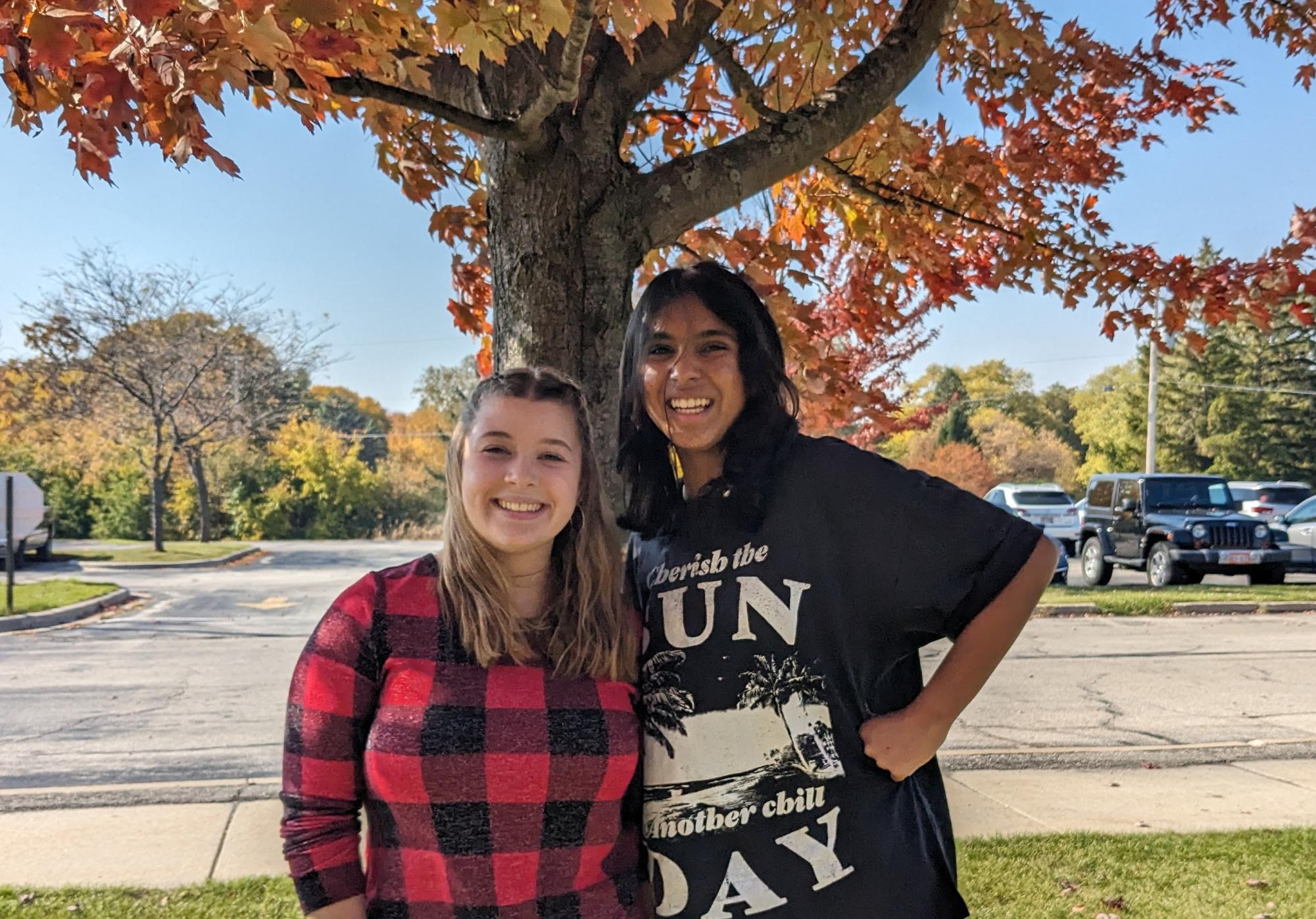 Megan Anderson (left), freshman with her friend Aayeshah Singh, freshman during band class 
