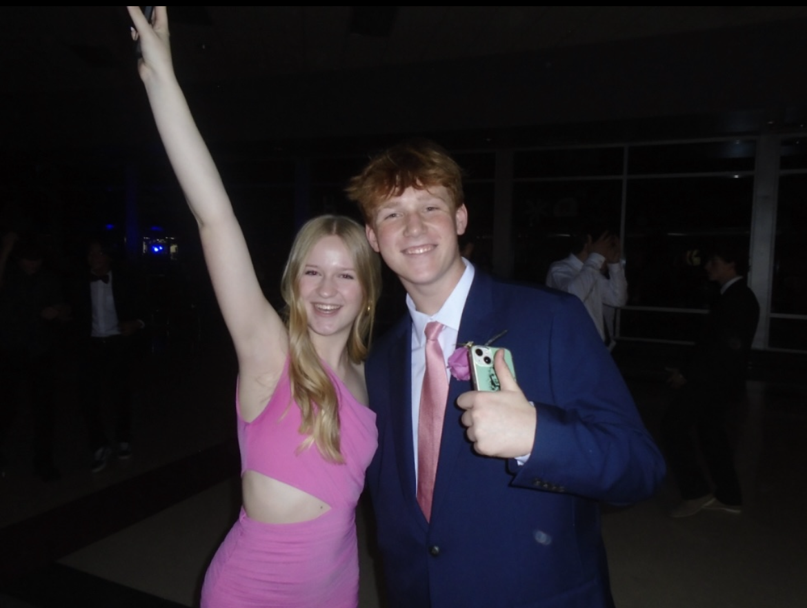 Blake Mayne (right), freshman, enjoys homecoming with Claire Heinrich (left), freshman.
