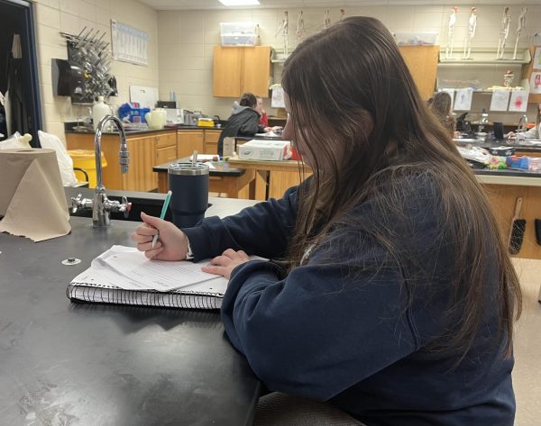 Olivia LaFond, senior, reads a lab for her second trimester class, AP Biology. 