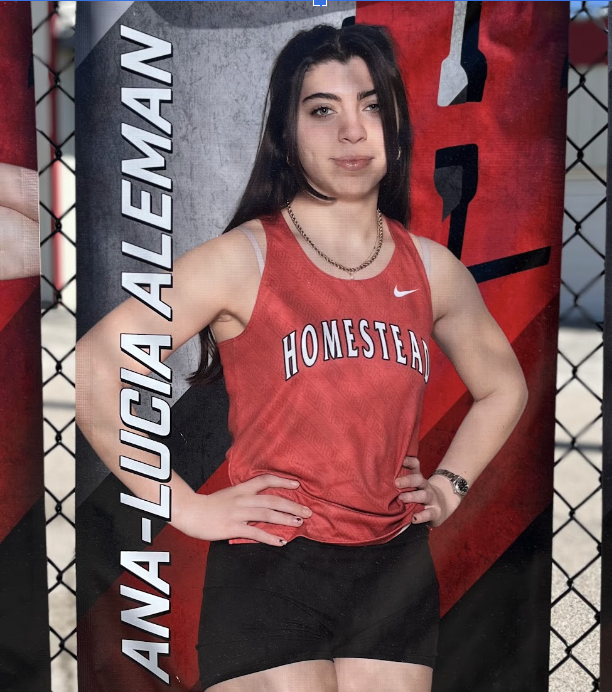Senior Ana-Lucia Aleman’s banner hangs outside the football field where both track and lacrosse players compete. 