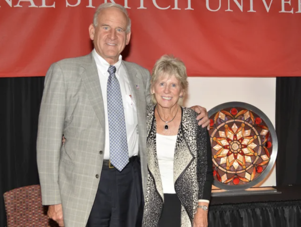 Mary and Ted Kellner pose after their donation to another Wisconsin university, Cardinal Stritch.