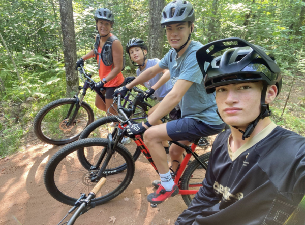 The Butler family enjoys a ride in the forest.