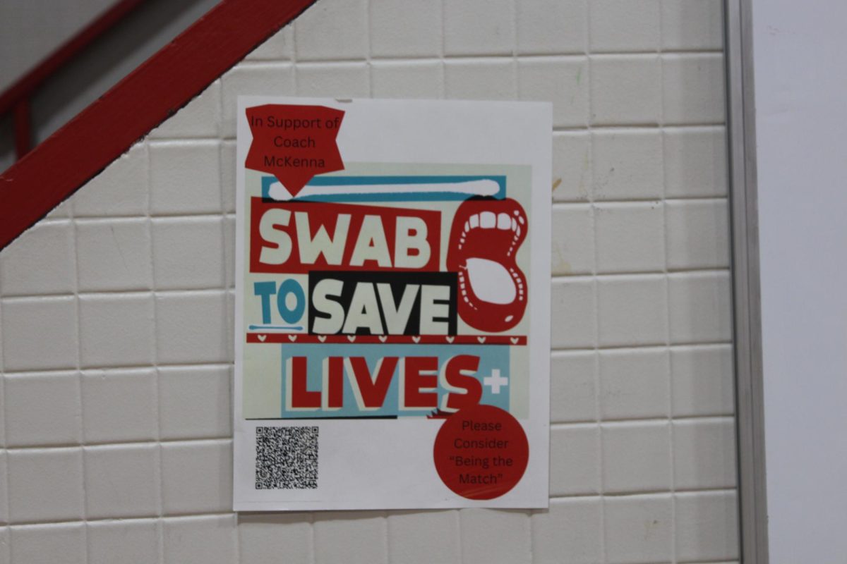 A poster that encourages people to see if they can donate bone marrow for Kevin McKenna hangs in the main gym.