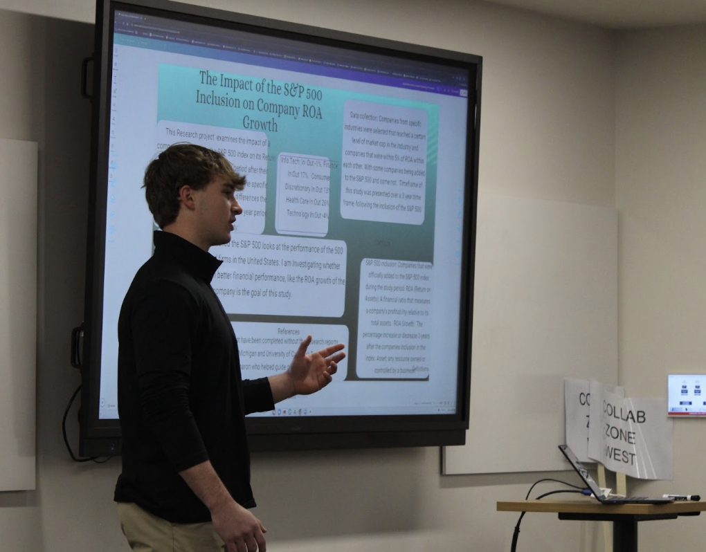 Keaton Lewis, senior, explains his research project about the S&P 500.