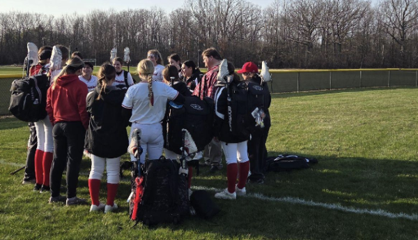 The varsity girls softball team gathers after their first win of the season at Homestead. The final
score was 5-4 against Port Washington.