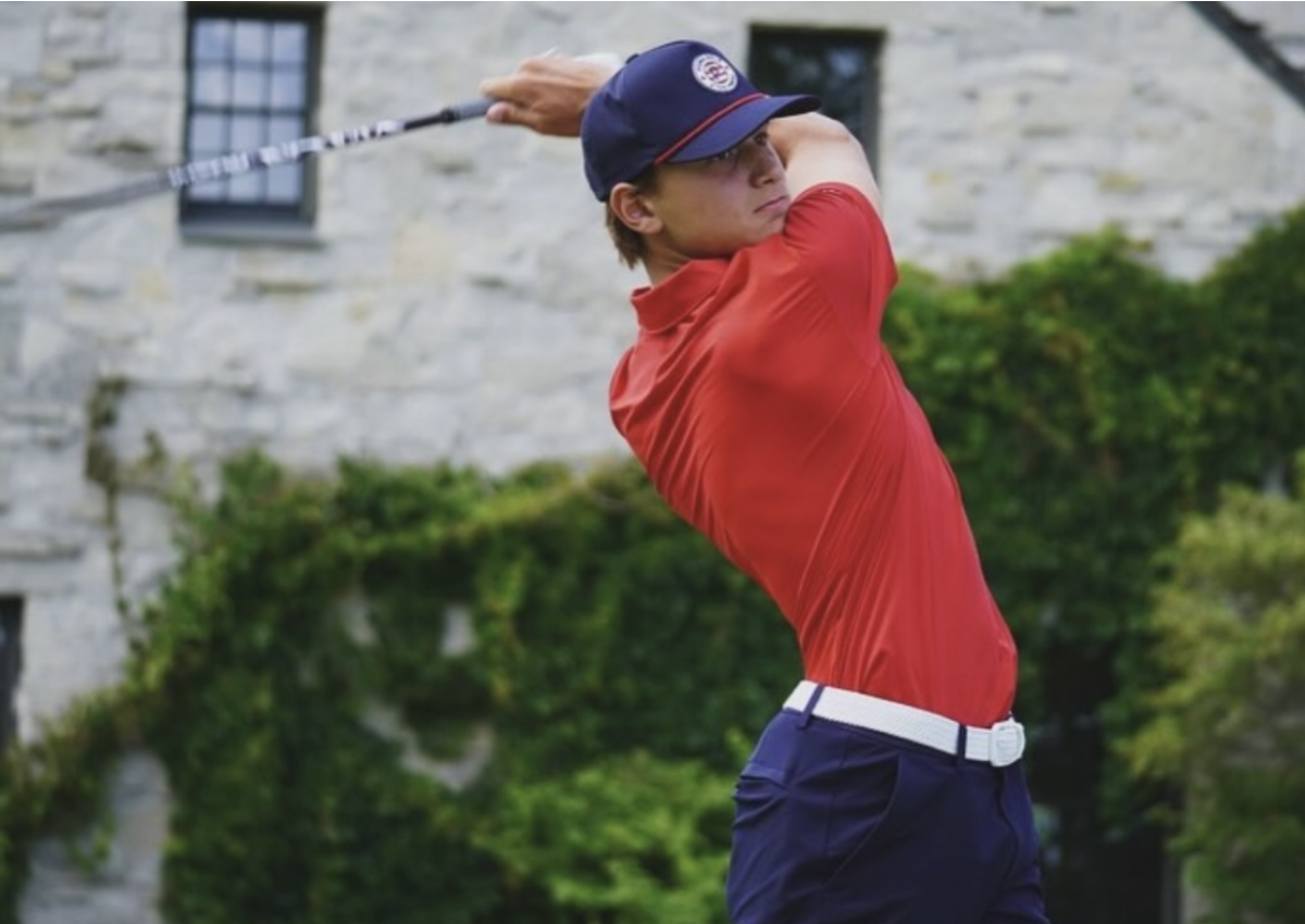 Matthew Handal, senior, strikes the ball at Whistling Straits Golf Course.