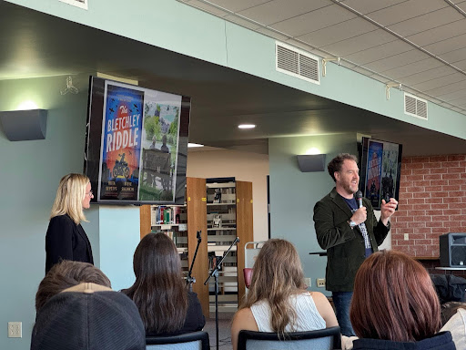 Steve Sheinkin and Ruta Sepetys, speaking to students in the HHS library. “Every writer I've ever met will admit to writing lousy first drafts. So the editing is really the most important part,” said Sheinkin.