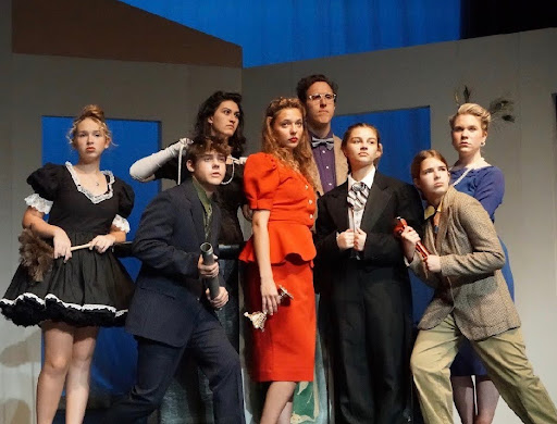 The Clue cast during dress rehearsal: Hedi Mansfield, Jay Hall, Ella Endres Neela Burger, Nadia Haswell, Aidan Bigonia, Sofia Anton, and Sammie Buesing 