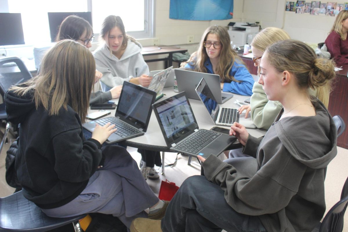 Lauren Faucett, junior, works on her deadlines.