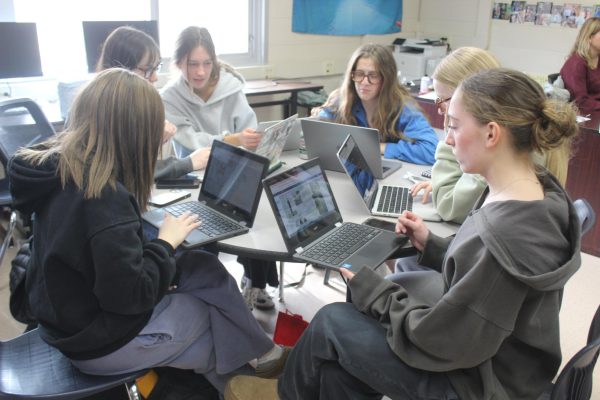 Lauren Faucett, junior, works on her deadlines.